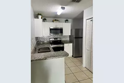 8819 Grand Palms Circle #A, Kissimmee, FL 34747 - Photo 7