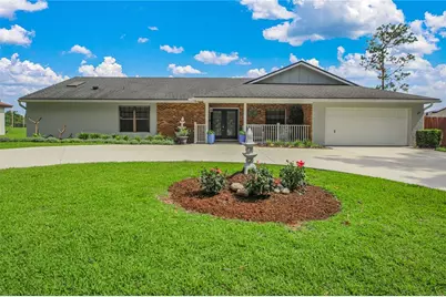 7243 Woodville Crescent, Orlando, FL 32819 - Photo 1