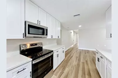 8646 Park Highland Drive, Orlando, FL 32818 - Photo 35