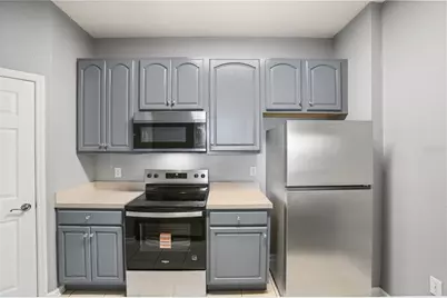 8775 Sartori Street #303, Orlando, FL 32829 - Photo 7