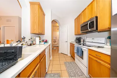 3326 Robert Trent Jones Drive #107, Orlando, FL 32835 - Photo 5