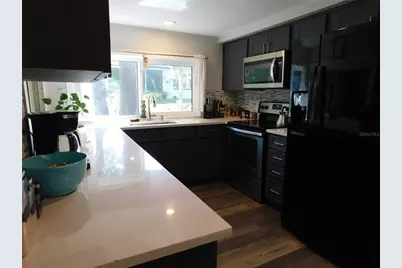 8020 Hunters Whip Row, Bayonet Point, FL 34667 - Photo 7