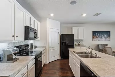 5946 Churchill Sq Way, Groveland, FL 34736 - Photo 13