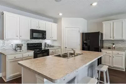 5946 Churchill Sq Way, Groveland, FL 34736 - Photo 11