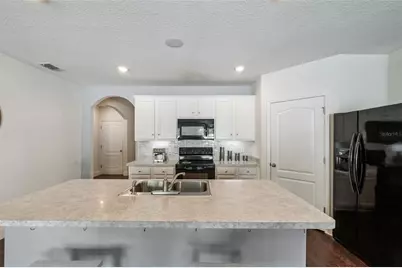 5946 Churchill Sq Way, Groveland, FL 34736 - Photo 9