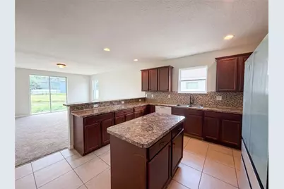 4876 Grassy Knoll Drive, Tavares, FL 32778 - Photo 11