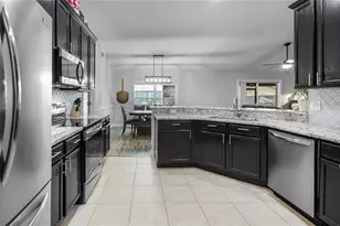 406 S Palm Ave, Howey in the Hills, FL 34737 - Photo 13
