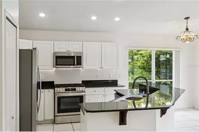 13635 Waterhouse Way, Orlando, FL 32828 - Photo 21
