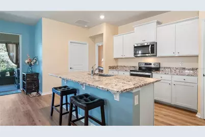 8033 Penrose Place, Wildwood, FL 34785 - Photo 5