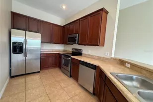 10387 Winding Marsh Trail, Orlando, FL 32832 - Photo 7