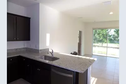 8051 Penrose Place, Wildwood, FL 34785 - Photo 9