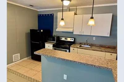 5521 Axiom Avenue, Orlando, FL 32839 - Photo 7