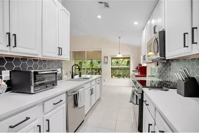 6440 Axeitos Terrace #110, Orlando, FL 32835 - Photo 21