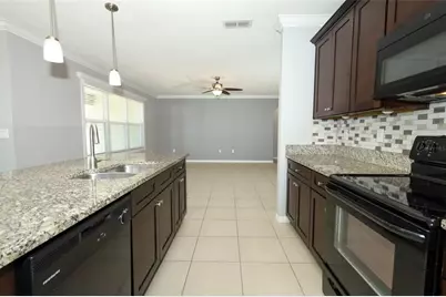 3802 Bishop Landing Way, Orlando, FL 32824 - Photo 15