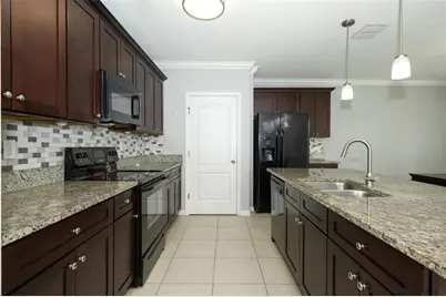 3802 Bishop Landing Way, Orlando, FL 32824 - Photo 11