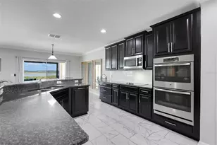 693 Black Eagle Dr, Groveland, FL 34736 - Photo 25