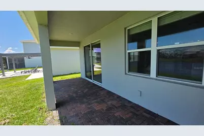 13925 Destin Beach Lane, Orlando, FL 32827 - Photo 37