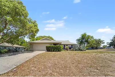 7006 Maplehurst Drive, Port Richey, FL 34668 - Photo 1