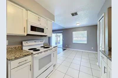 8426 Village Green Rd, Orlando, FL 32818 - Photo 23