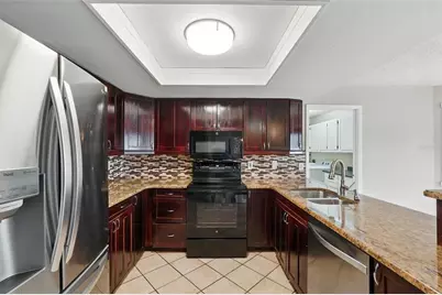 7925 Tumblestone Drive, Orlando, FL 32819 - Photo 17