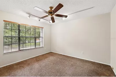 7925 Tumblestone Drive, Orlando, FL 32819 - Photo 29