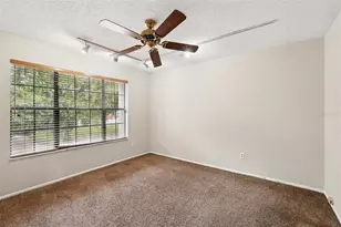 7925 Tumblestone Dr, Orlando, FL 32819 - Photo 29
