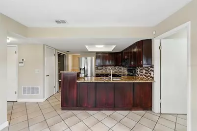 7925 Tumblestone Drive, Orlando, FL 32819 - Photo 15