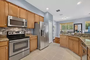 7438 Chelsea Harbour Dr, Orlando, FL 32829 - Photo 11
