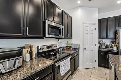 10837 Wyne Tree Court, Orlando, FL 32824 - Photo 13