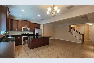 9551 Silver Buttonwood Street, Orlando, FL 32832 - Photo 5