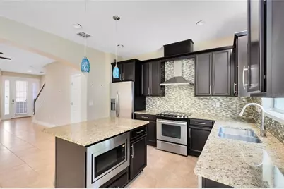 9625 Silver Buttonwood Street, Orlando, FL 32832 - Photo 3
