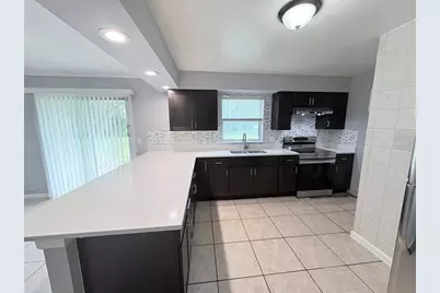 4428 Carousel Road, Orlando, FL 32808 - Photo 11