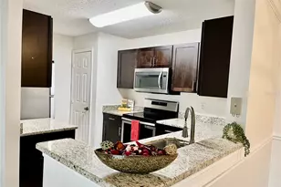 1939 Summer Club Apt Dr, Oviedo, FL 32765 - Photo 7