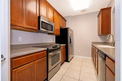 3338 Robert Trent Jones Drive #10604, Orlando, FL 32835 - Photo 5