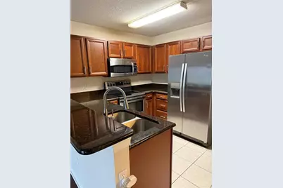 584 Cresting Oak Circle #22, Orlando, FL 32824 - Photo 7
