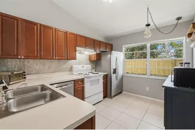 7828 Wortham Court, Orlando, FL 32825 - Photo 9