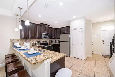 8213 Roseville Boulevard, Champions Gate, FL 33896 - Photo 9
