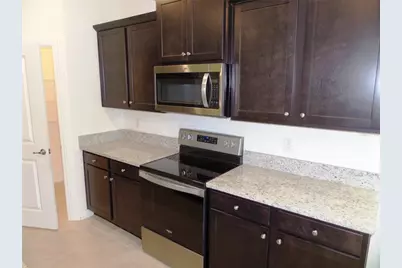7997 Penrose Place, Wildwood, FL 34785 - Photo 11