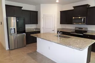 7997 Penrose Pl, Wildwood, FL 34785 - Photo 7