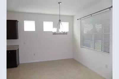 7997 Penrose Place, Wildwood, FL 34785 - Photo 13
