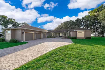 12131 Eagles Point Court, Grand Island, FL 32735 - Photo 1