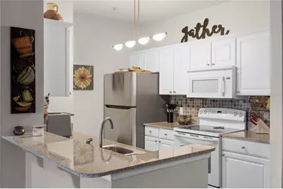 430 Southern Pecan Circle #207, Winter Garden, FL 34787 - Photo 1