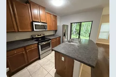 6025 NE Apollos Corner Way, Orlando, FL 32829 - Photo 5
