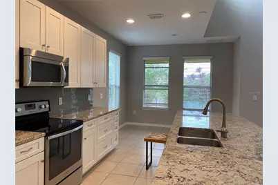 987 Fountain Coin Loop, Orlando, FL 32828 - Photo 15