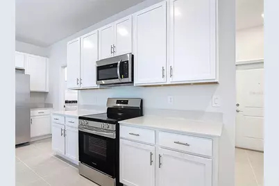 2433 Spring Tune Alley, Kissimmee, FL 34744 - Photo 11