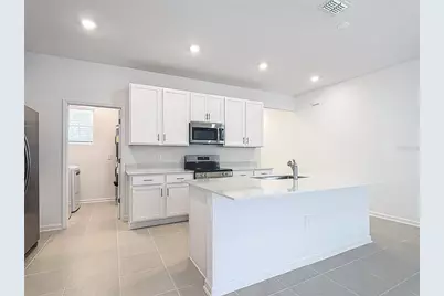 2433 Spring Tune Alley, Kissimmee, FL 34744 - Photo 9
