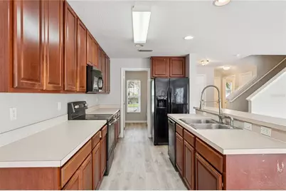 3026 Wild Tamarind Boulevard #3026, Orlando, FL 32828 - Photo 31