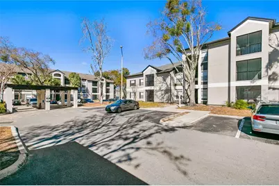 7605 Pissarro Drive #13204, Orlando, FL 32819 - Photo 19