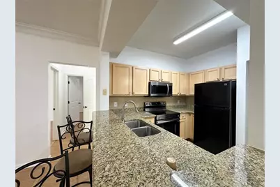 12843 Madison Pointe Circle #201, Orlando, FL 32821 - Photo 5