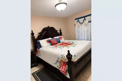 7047 Plumwood Court, Orlando, FL 32818 - Photo 5